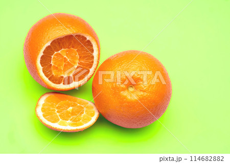 Juicy sliced oranges on green. Ready to eat,drink and cook 114682882