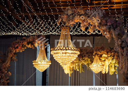 Great place for evening wedding ceremony. Large crystal lamps decorate the location Great place for evening wedding ceremony. Large crystal lamps decorate the location 114683690