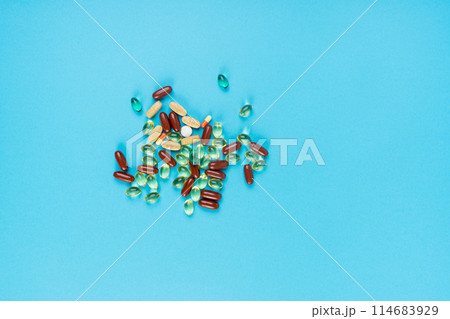 Color Pill Capsules on Color Background, Analgesic Pile, Transparent Painkiller Drugs Mix, Sedative Pills 114683929