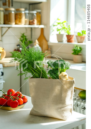 Bag filled with vegetables on kitchen counter 114685408