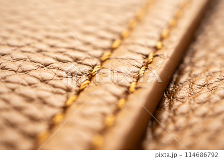 luxury brown leather bag texture background with stitching 114686792