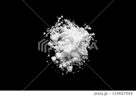 White snow isolated on black background close up 114687084
