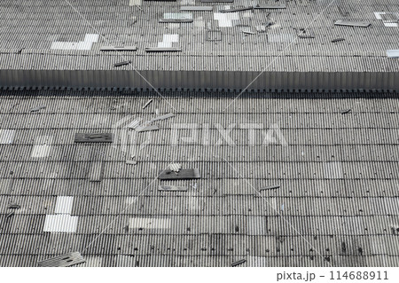 Old roof corner tiles that were damaged by storms Old roof corner tiles that were damaged by storms 114688911