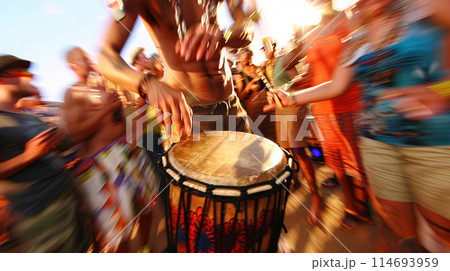 a festival-goer reveling in the vibrant energy of a drum circle, their hands beating out a rhythmic cadence a festival-goer reveling in the vibrant energy of a drum circle, their hands beating out a rhythmic cadence 114693959