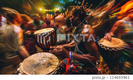 a festival-goer reveling in the vibrant energy of a drum circle, their hands beating out a rhythmic cadence 114693961