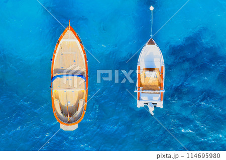 Drone view of a motor boats. Sea transportation. Vacation and holidays. Drone view of a motor boats. Sea transportation. Vacation and holidays. 114695980