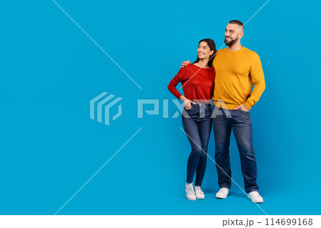 In the scene, a man and a woman are seen standing side by side, both facing forward. They appear to be close to each other, with no physical contact but showing a sense of closeness, copy space 114699168