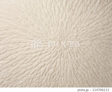 Beige light soft matte wool knitted rough texture close up 114700213