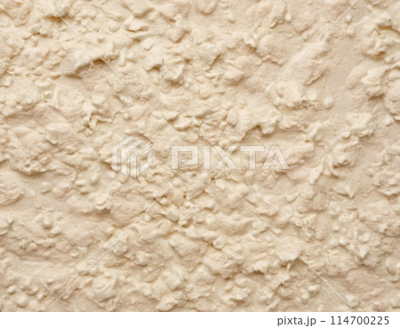 Beige light soft matte rough texture close up 114700225