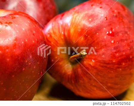 Wet Apple Freshness. Detailed view of wet apples, apt for culinary arts or nutrition education. Wet Apple Freshness. Detailed view of wet apples, apt for culinary arts or nutrition education. 114702502