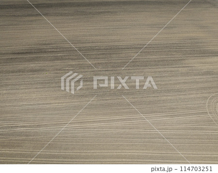 springtime aerial view of plowed corn fields in central Missouri 114703251