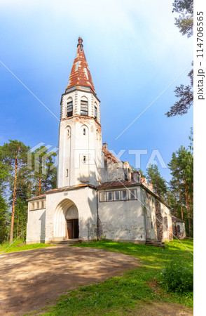 Beautiful view to Finnish Lutheran Church in Lumivaara village. Building in Neo-Gothic style in summer sunny day. Attractions of Lahdenpokh district. Designed architect Adolf Ilmari. Karelia Russia. Beautiful view to Finnish Lutheran Church in Lumivaara village. Building in Neo-Gothic style in summer sunny day. Attractions of Lahdenpokh district. Designed architect Adolf Ilmari. Karelia Russia. 114706565