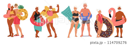 Diverse Group Of Senior Friends Ready For Beach Outing, Each Holding Vibrant Inflatable Swim Rings, Embodying Joy 114709276