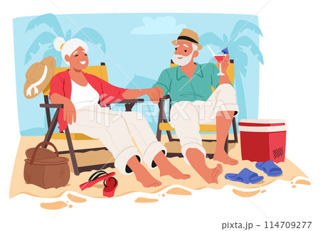 Older Couple Enjoys A Relaxing Day On A Sandy Beach, Sitting In Beach Chairs With Tropical Drinks In Hand Older Couple Enjoys A Relaxing Day On A Sandy Beach, Sitting In Beach Chairs With Tropical Drinks In Hand 114709277