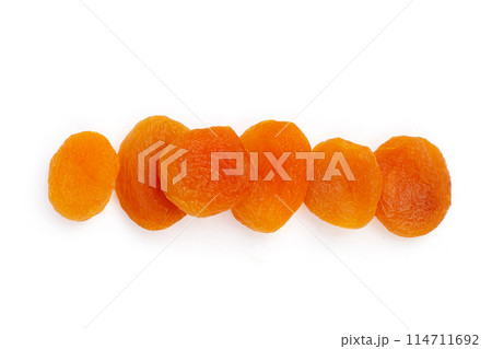 Dried apricots on white background. Dried apricots on white background. 114711692