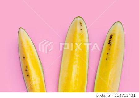 Yellow watermelon slices on white background. 114713431