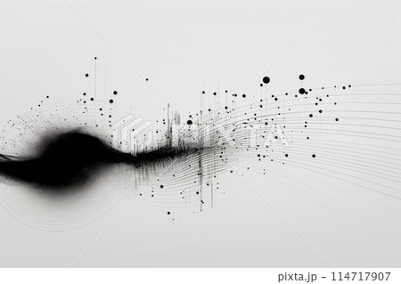 A black ink splash on a white surface, creating a visually striking contrast 114717907