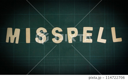 misspell word on green cutting board 114722706