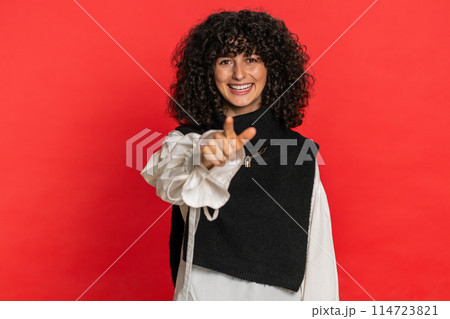 Smiling happy woman pointing forward to camera, choosing lucky victory winner, indicating, promotion Smiling happy woman pointing forward to camera, choosing lucky victory winner, indicating, promotion 114723821