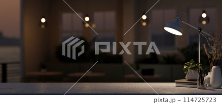 Space for displaying products on a table in a contemporary, dark coffee shop or restaurant at night. 114725723