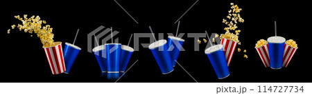 Paper striped bucket with popcorn and cup of soft drink isolated on black background, movie night concept or watching TV. Paper striped bucket with popcorn and cup of soft drink isolated on black background, movie night concept or watching TV. 114727734