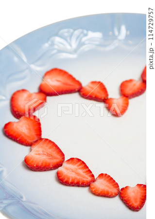 Beautiful heart symbol from chopped red juicy strawberry Beautiful heart symbol from chopped red juicy strawberry 114729757