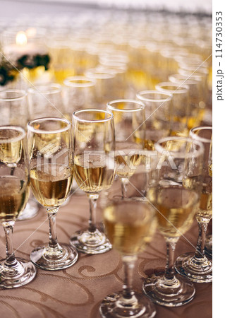 Elegant champagne glasses 114730353