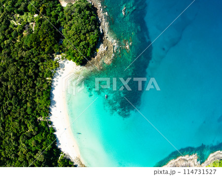 Aerial view Top down seashore background,Waves crashing on rock cliff, Beautiful dark sea surface in sunny day summer background, Amazing seascape top view seacoast at Phuket beach Thailand Aerial view Top down seashore background,Waves crashing on rock cliff, Beautiful dark sea surface in sunny day summer background, Amazing seascape top view seacoast at Phuket beach Thailand 114731527