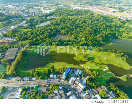 Aerial view of beautiful green golf field fairway and putting green, Top down image for sport background and travel nature background, Amazing green nature view Aerial view of beautiful green golf field fairway and putting green, Top down image for sport background and travel nature background, Amazing green nature view 114731532