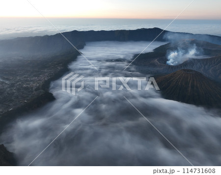 Aerial view Mountains at Bromo volcano during sunrise sky,Beautiful Mountains Penanjakan in Bromo Tengger Semeru National Park,East Java,Indonesia.Nature landscape background 114731608