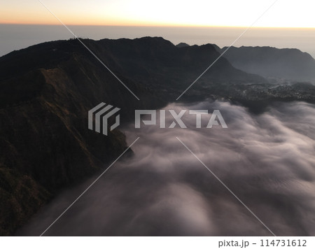 Aerial view Mountains at Bromo volcano during sunrise sky,Beautiful Mountains Penanjakan in Bromo Tengger Semeru National Park,East Java,Indonesia.Nature landscape background Aerial view Mountains at Bromo volcano during sunrise sky,Beautiful Mountains Penanjakan in Bromo Tengger Semeru National Park,East Java,Indonesia.Nature landscape background 114731612
