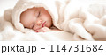 Cute little baby sleeping in soft bed. Family concept. 114731684