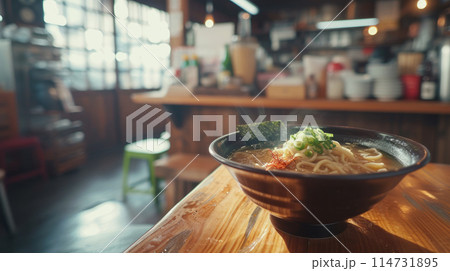 A bowl of hot ramen in an Asian restaurant. 114731895