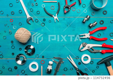 Plumbing toolkit on work desk top view flat lay Plumbing toolkit on work desk top view flat lay 114732456