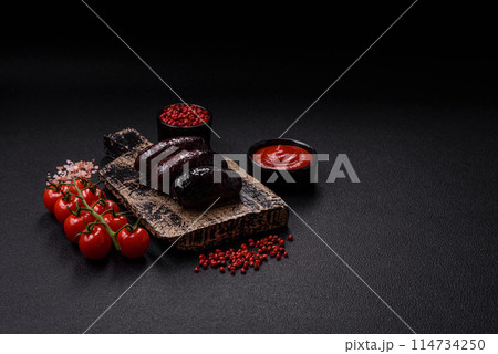 Delicious black blood sausage or black pudding with spices and herbs Delicious black blood sausage or black pudding with spices and herbs 114734250