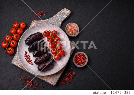 Delicious black blood sausage or black pudding with spices and herbs Delicious black blood sausage or black pudding with spices and herbs 114734382