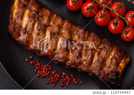 Delicious juicy grilled ribs with honey and mustard sauce 114734447