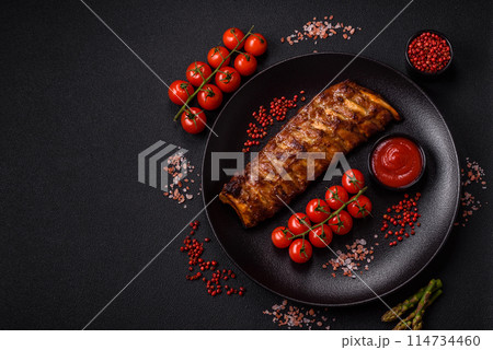 Delicious juicy grilled ribs with honey and mustard sauce 114734460