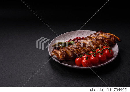 Delicious juicy grilled ribs with honey and mustard sauce 114734465