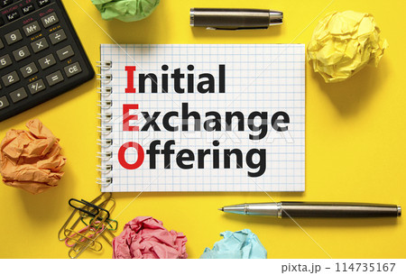IEO initial exchange offering symbol. Concept words IEO initial exchange offering on beautiful note. Beautiful yellow background. Business IEO initial exchange offering concept. Copy space. 114735167