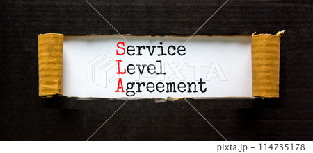SLA service level agreement symbol. Concept words SLA service level agreement on beautiful white paper. Beautiful black paper background. Business SLA service level agreement concept. Copy space. 114735178