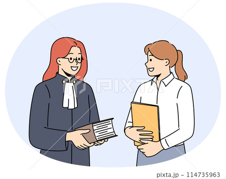 Female lawyer and paralegal in office Female lawyer and paralegal in office 114735963