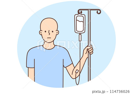 Bald man with dropper get chemo treatment Bald man with dropper get chemo treatment 114736026