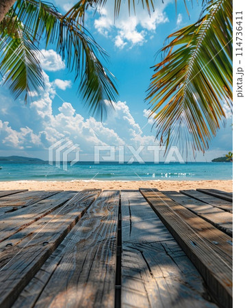 Empty wood table over blue sea, beach and palm leaves background in summer day. Space for product display. 114736411