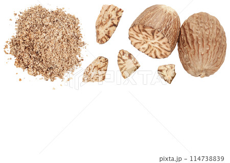 Whole and grated nutmeg isolated on white background. Top view with copy space for your text. Flat lay Whole and grated nutmeg isolated on white background. Top view with copy space for your text. Flat lay 114738839