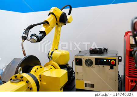 Welding robot arms on a smart factory Welding robot arms on a smart factory 114740327
