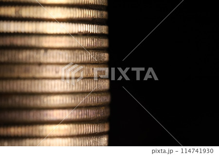 Stack of coins in close-up, texture of old coins Stack of coins in close-up, texture of old coins 114741930
