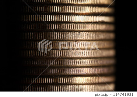 Stack of coins in close-up, texture of old coins Stack of coins in close-up, texture of old coins 114741931