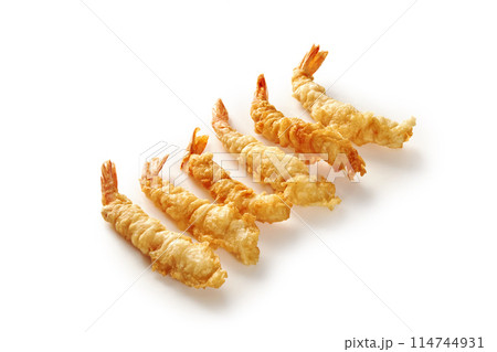 Traditional Japanese crispy tempura shrimps isolated on white Traditional Japanese crispy tempura shrimps isolated on white 114744931