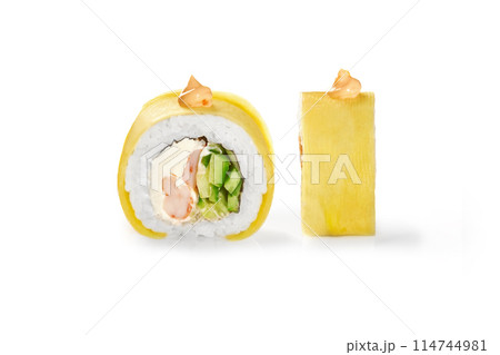 Mango-topped sushi roll with crab, cream cheese, and cucumber 114744981